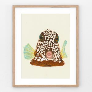 Watercolor painting of a spotted trunkfish with polka dots and colorful fins, adding playful charm to coastal decor.