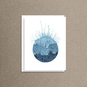 A round watercolor water splash fades from pale blue to deep indigo on a blank note card — abstract, moody, and made for anyone who calls themselves a water lover.