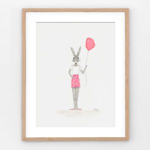 Say hello to Balloon Bunny—the definition of darling. Dressed in pink polka dot shorts and a crisp white tee, this mixed media cutie holds tight to a pink balloon, ready to lift your spirits sky-high. One glance and you’ll feel the kind of whimsy that turns an ordinary day into something magical. A Cathy Turner original that knows how to tug on your heartstrings in the sweetest way.