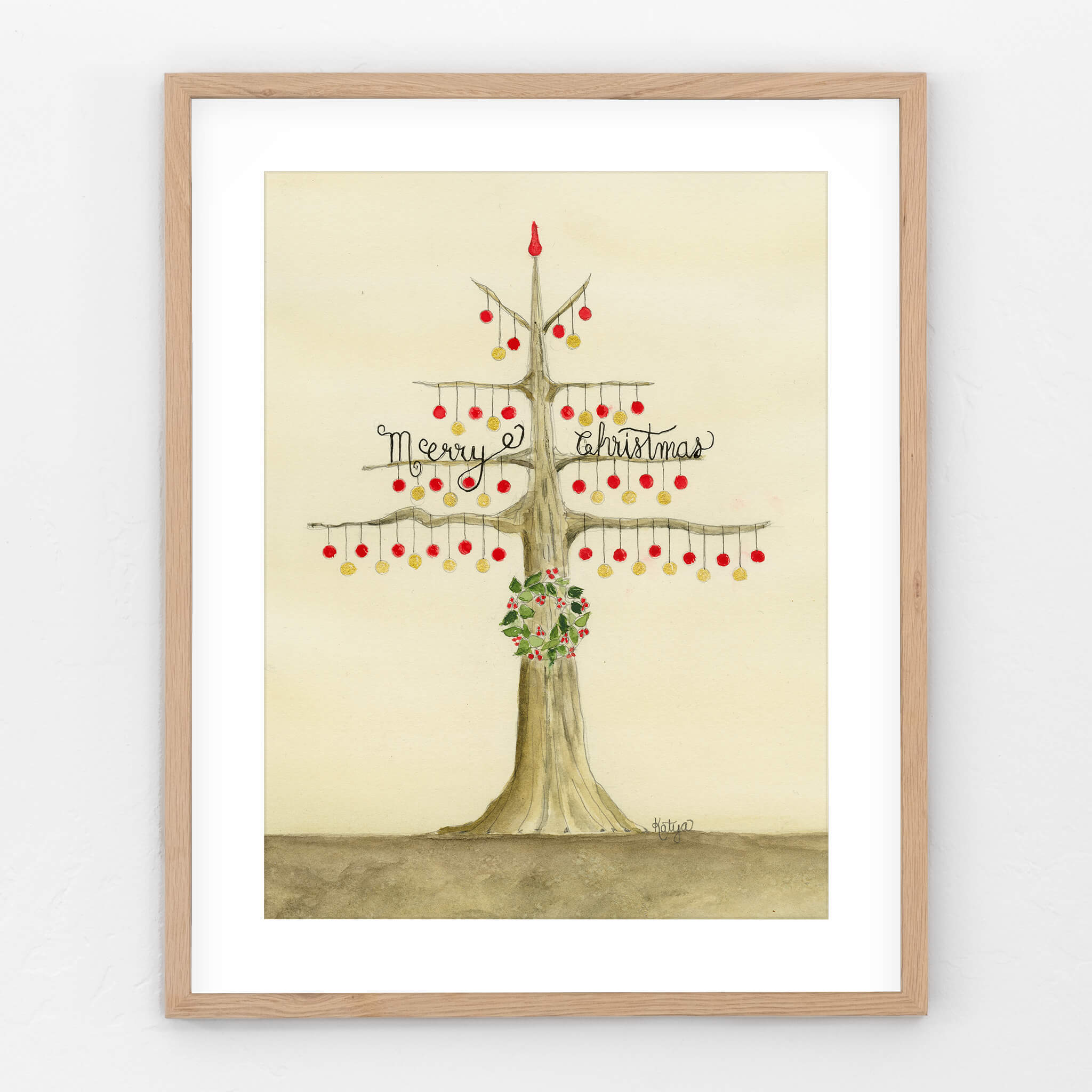Original watercolor Christmas ornaments painting of a bare-branched tree hung with red and gold baubles, a holly wreath, and Merry Christmas calligraphy, in an oak frame
