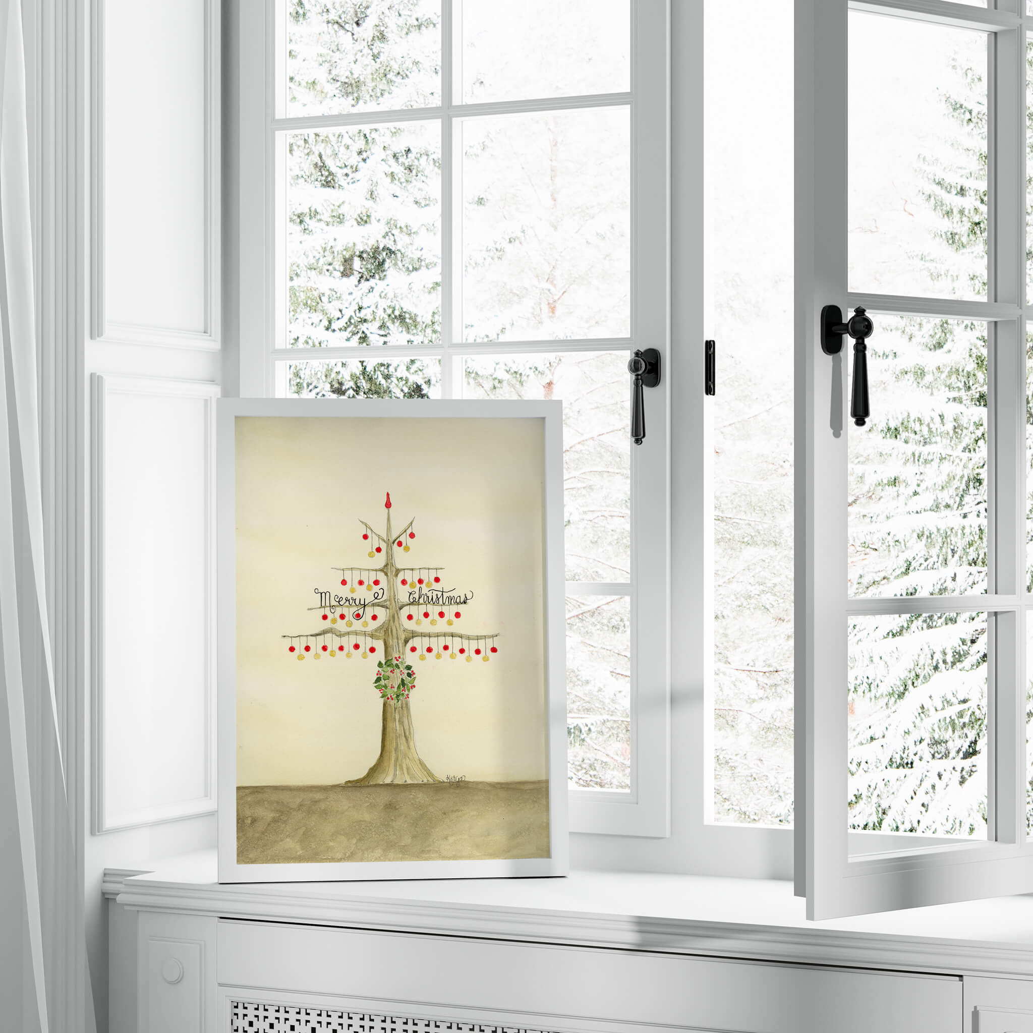 Original Christmas watercolor painting of a tree with red and gold baubles and a holly wreath in a white frame, on a windowsill overlooking snowy pines