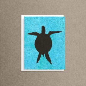 Turtle silhouette note card and envelope on natural linen background