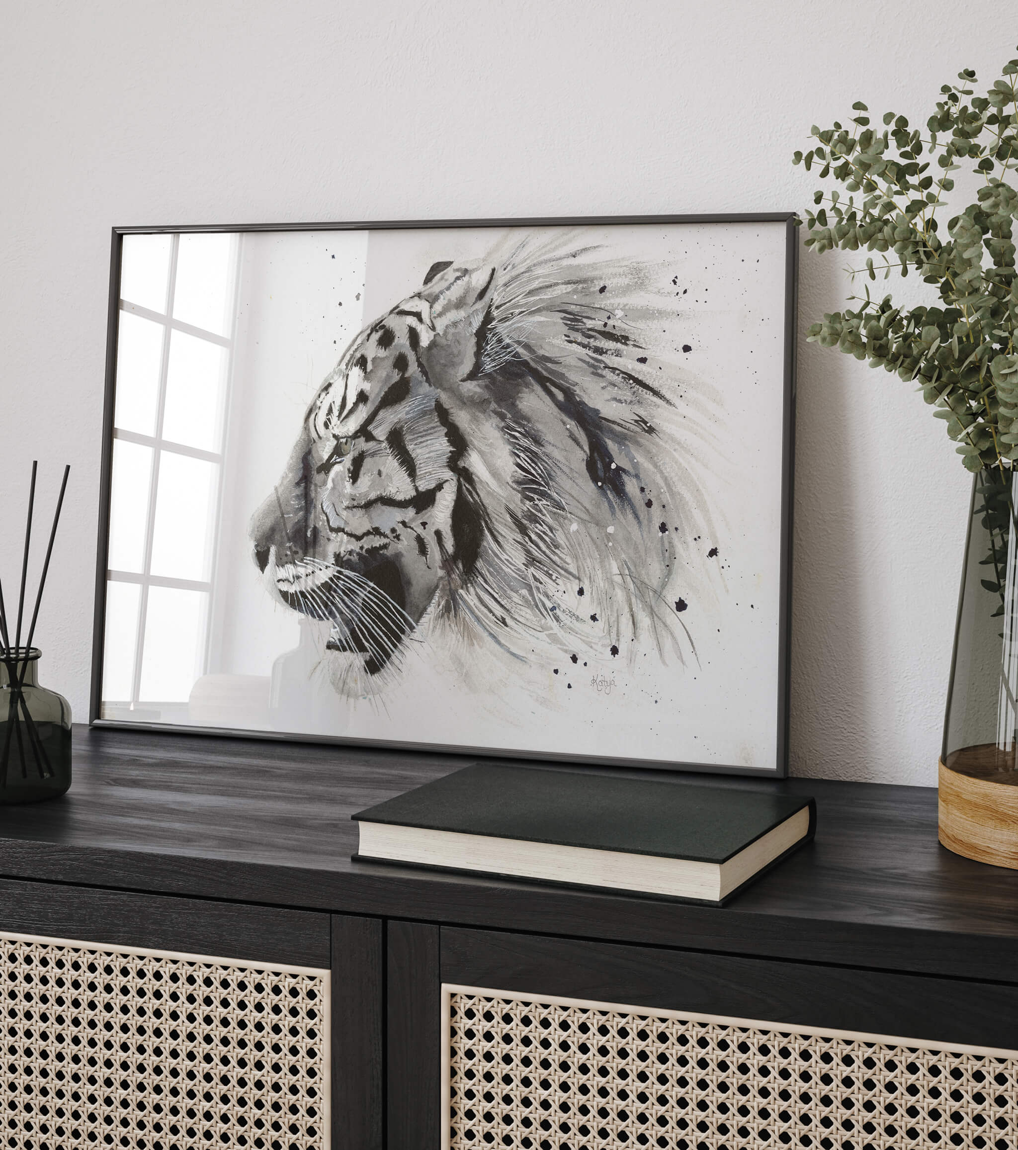 Untamed black and white tiger print framed on a dark credenza in a bright, modern living room