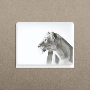 Charcoal lioness note card, her profile turned toward the light.