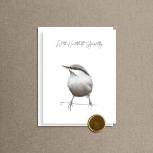With Heartfelt Sympathy card featuring a nuthatch printed from a charcoal drawing, script lettering, and a gold songbird wax seal on a linen background.
